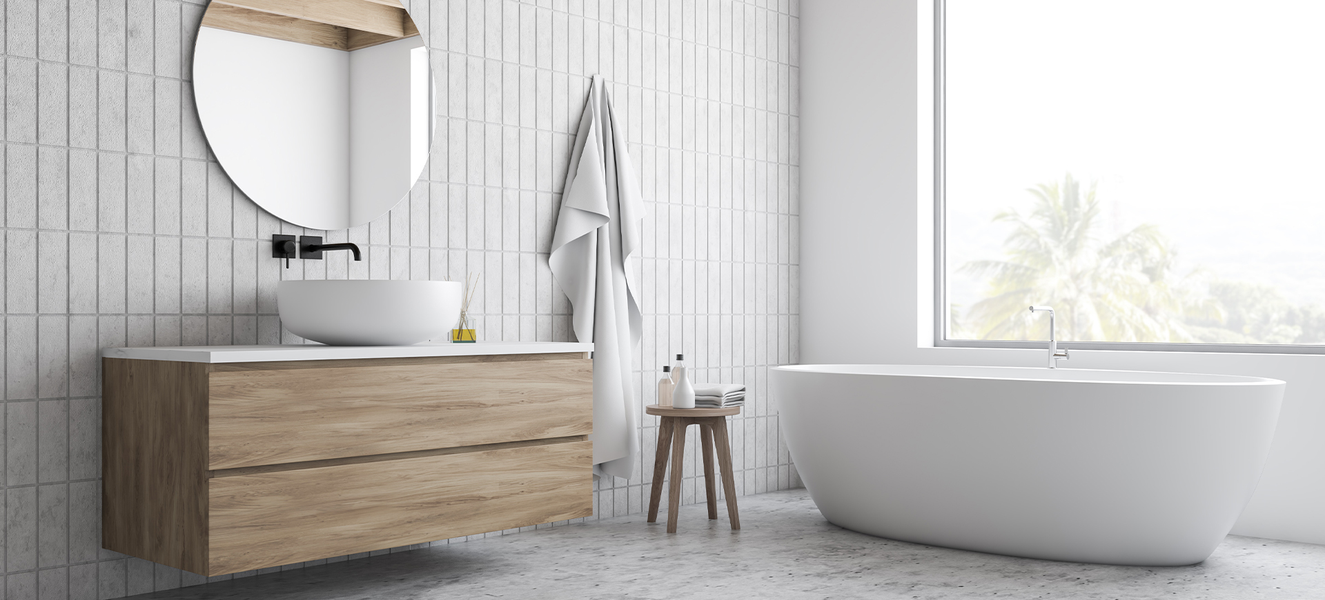 Waschtischunterschrank aus hellem Holz mit zwei Schubladen und weißer Ablagefläche in einem großen Bad mit freistehender Wanne